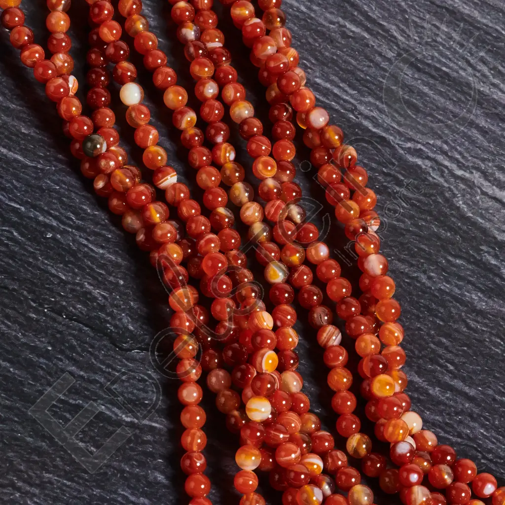 Fil de perles Cornaline – Perles naturelles 6mm – Grossiste minéraux