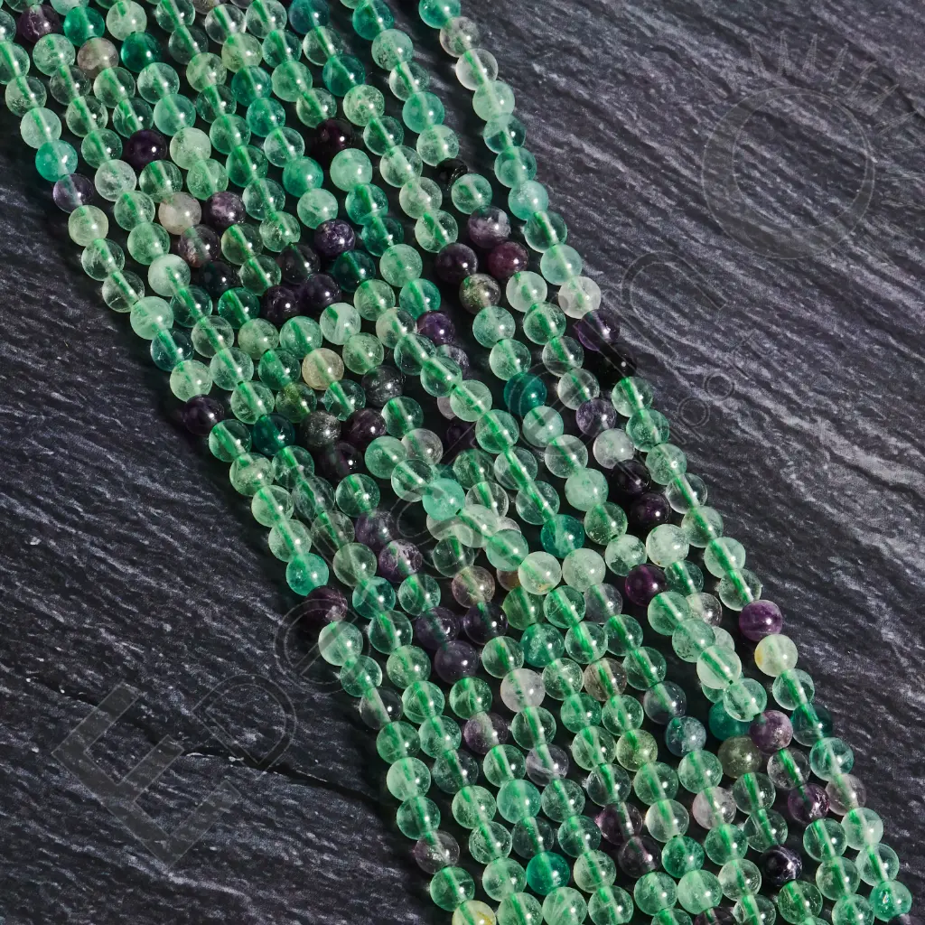 Fil de perles Fluorite – Perles naturelles 6mm – Grossiste minéraux