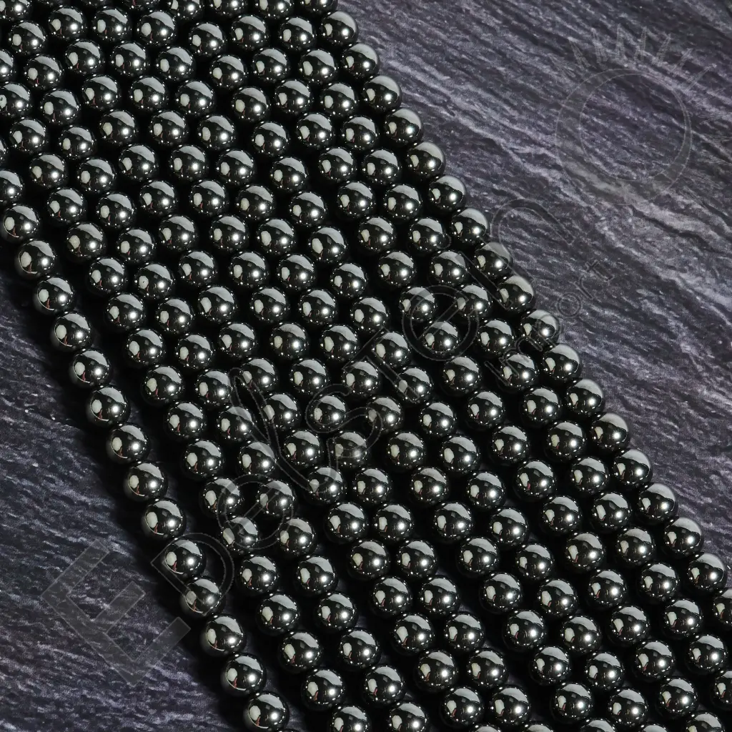 Fil de perles Hématite – Perles naturelles 8mm – Grossiste minéraux