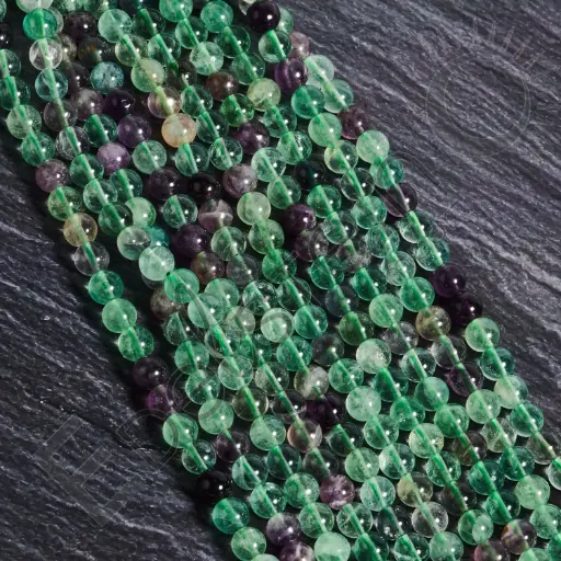 [FPE-FLU08] Fil de perles Fluorite – Perles naturelles 8mm – Grossiste minéraux