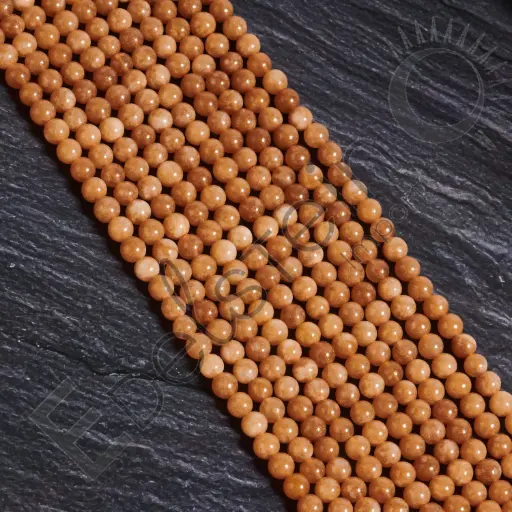 [FPE-PDSO06] Fil de perles Pierre de Soleil – Perles naturelles 6mm – Grossiste minéraux