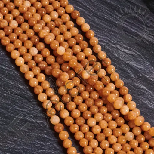 [FPE-PDSO08] Fil de perles Pierre de Soleil – Perles naturelles 8mm – Grossiste minéraux